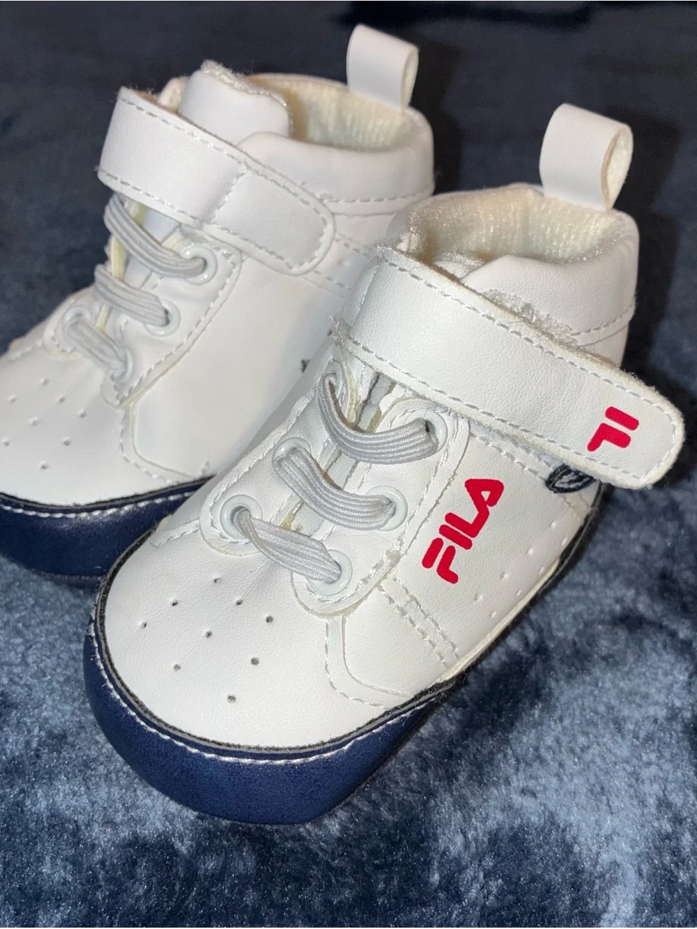 Fila White Baby Sneakers with Navy Toe and Red Logo